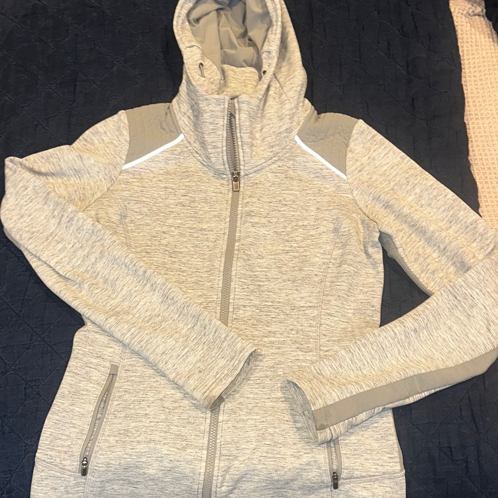 Athleta size small zip up hooded jacket with longer back and thumb holes